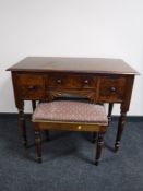 A William IV mahogany dressing table and a stool