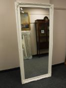 A cream Victorian style mirror,