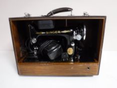 A mid 20th century Singer electric sewing machine