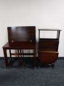 A mid twentieth century turnover top side table, fitted two beneath,