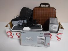A box of vintage typewriter, Ipod docking station, boxed Sony Walkman,
