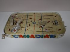 A boxed vintage Munro Games electric table top ice hockey game