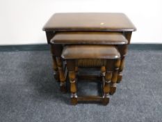 A nest of three Ercol tables