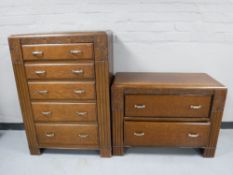 A twentieth century carved oak five drawer chest,