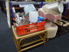 A conservatory side table, wicker stool,