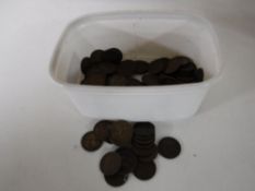 A tub containing Georgian farthings