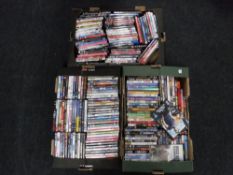 Three boxes of assorted DVDs