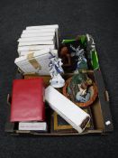 Two boxes containing continental figures, collectors plates, trinket boxes,