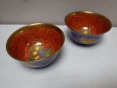 A pair of Wedgwood blue lustre York cups, designed by Daisy Makeig-Jones, pattern Z5457,