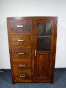 A contemporary mango wood cabinet,