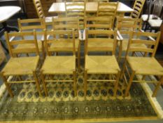A set of eight pine rush seated dining chairs