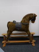 A Mamas and Papas rocking horse