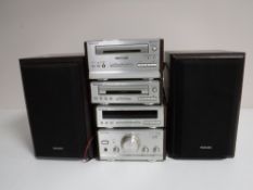 A Technics four piece micro hi/fi system and a pair of speakers