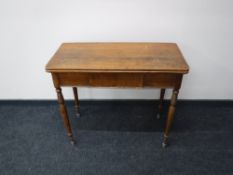 A late 19th century mahogany turnover top tea table