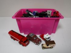 A box containing a large quantity of assorted die cast vehicles, including Beetles, Rolls Royce,