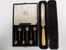 A set of six silver coffee spoons, cased,