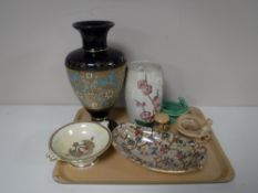 A tray containing a Royal Doulton Lambeth ware vase (a/f), three pieces of Maling, Sylvac pieces,