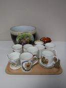 A tray of commemorative tea ware and a hand painted porcelain planter with gilded decoration