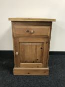 A reclaimed pine cupboard fitted a drawer