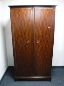 A Stag Minstrel double door wardrobe,
