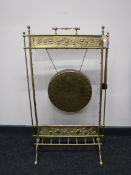 A brass Burmese gong and beater on stand
