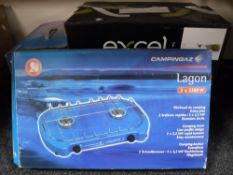 Three folding garden chairs in carry bags, camping stove, travel cooler,