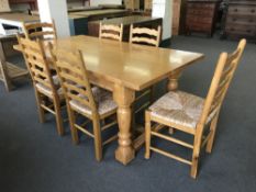 A good quality light oak farmhouse style refectory dining table, length 180 cm,