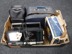 A box containing an Alba TV/Radio cassette recorder, a Kodak Instant Camera,