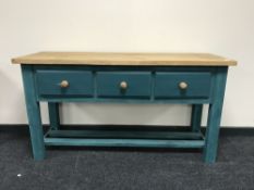 A painted pine kitchen three drawer preparation table