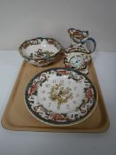 A tray containing four pieces of Masons china