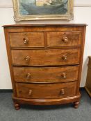 A Victorian mahogany bowfronted five drawer chest,
