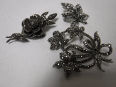 Three vintage silver marcasite brooches (2)