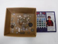 A collection of English coins to include silver three pence pieces (William IV, Victorian, George V,
