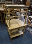 A mid 20th century blonde oak lamp table and an occasional table