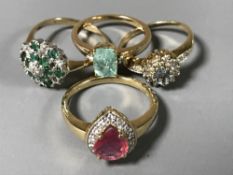 Four 9ct gold diamond set rings, 12g.