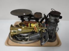 A tray containing vintage blow torch, brass bugle, kitchen scales and weights,