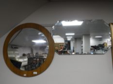 A mirror mounted on a foam wood board and an unframed mirror