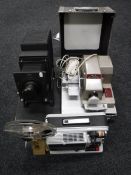 A cased Aldis projector, together with a Heuatier projector, a Mutin & Co projector,