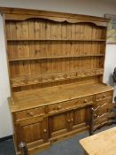 A large pine kitchen dresser,