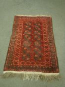 A Persian Bokhara rug