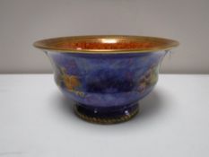 A Wedgwood blue lustre bowl, of waisted form, designed by Daisy Makeig-Jones, pattern Z5457,