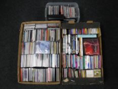 Two boxes and a basket of assorted CD's