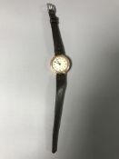 A 9ct gold Harwood wrist watch - * John Harwood is credited for inventing the first automatically