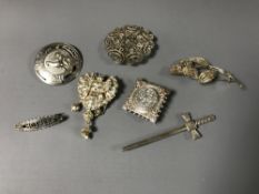Seven assorted silver brooches (7)