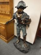 A patinated bronze fountain statue, fisher boy,