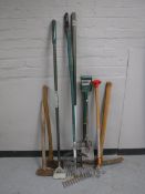 A box containing a quantity of garden tools