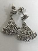 A pair of 18ct white gold diamond earrings, 7.2g.