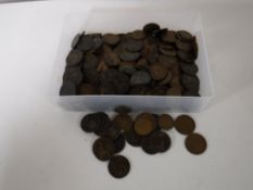 A tub containing a quantity of Victorian and Georgian pennies and half pennies