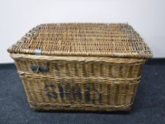 A large wicker laundry basket