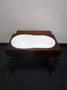 A Victorian mahogany child's bath table with liner